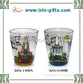 painted shot glass with building dsign